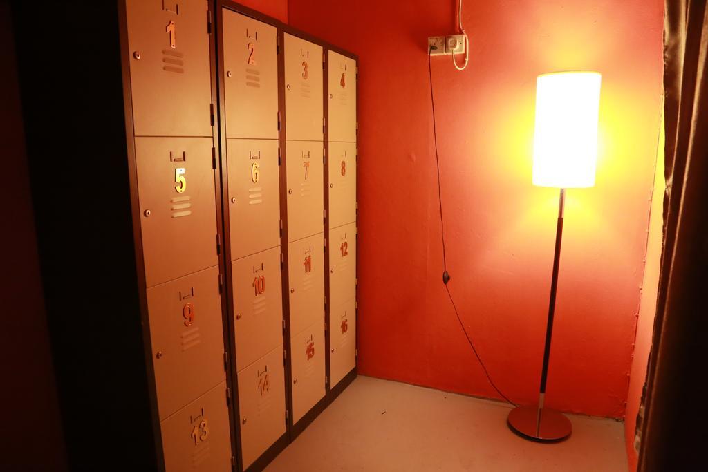 Gibbon Guesthouse Kuching Værelse billede